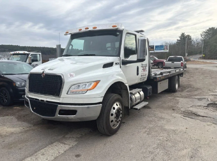2023 International MV607 Roll Back Tow Truck — International MV607 — Reading, Massachusetts