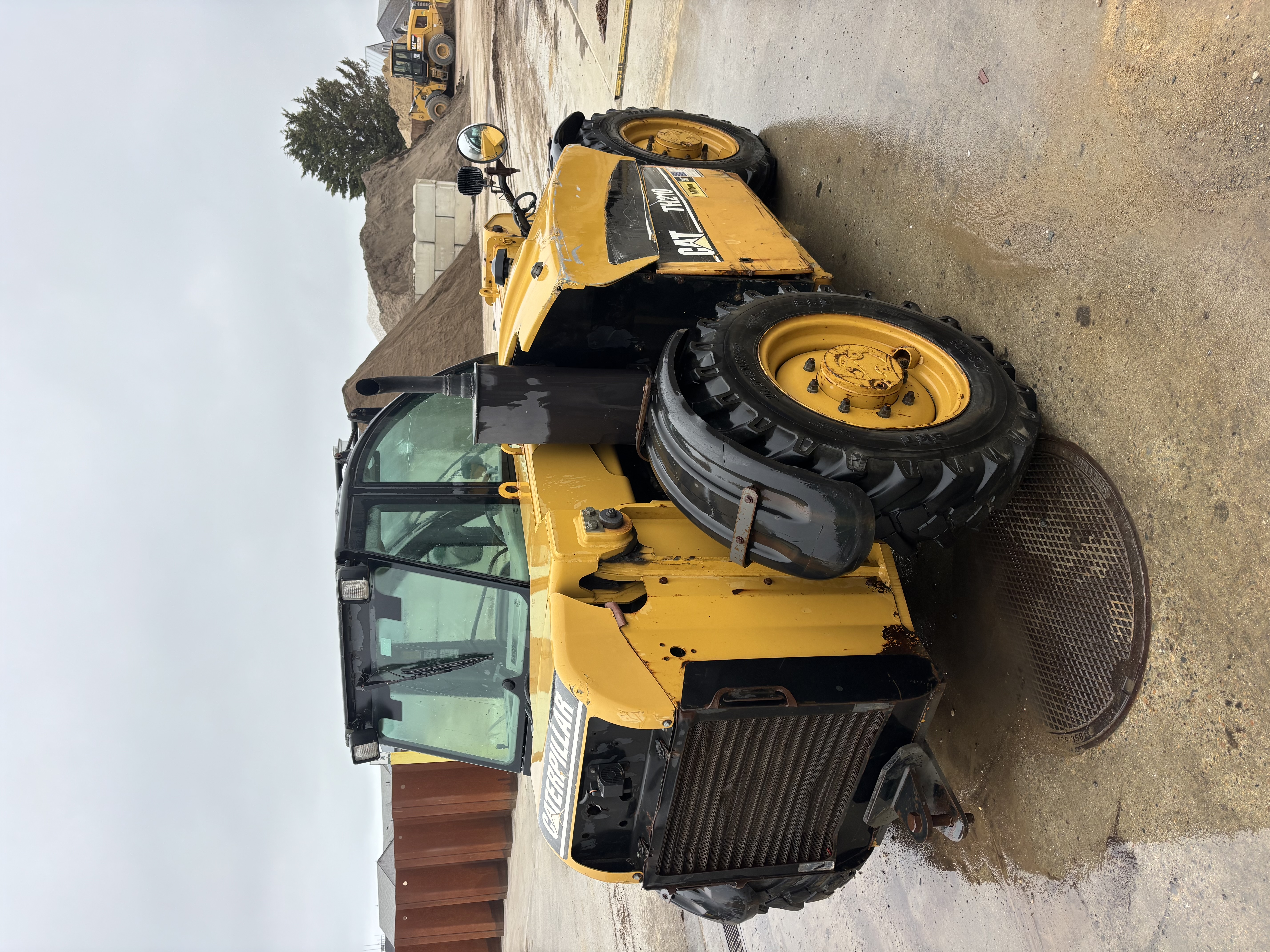 Caterpillar TH210 — $30,000 — photo 5