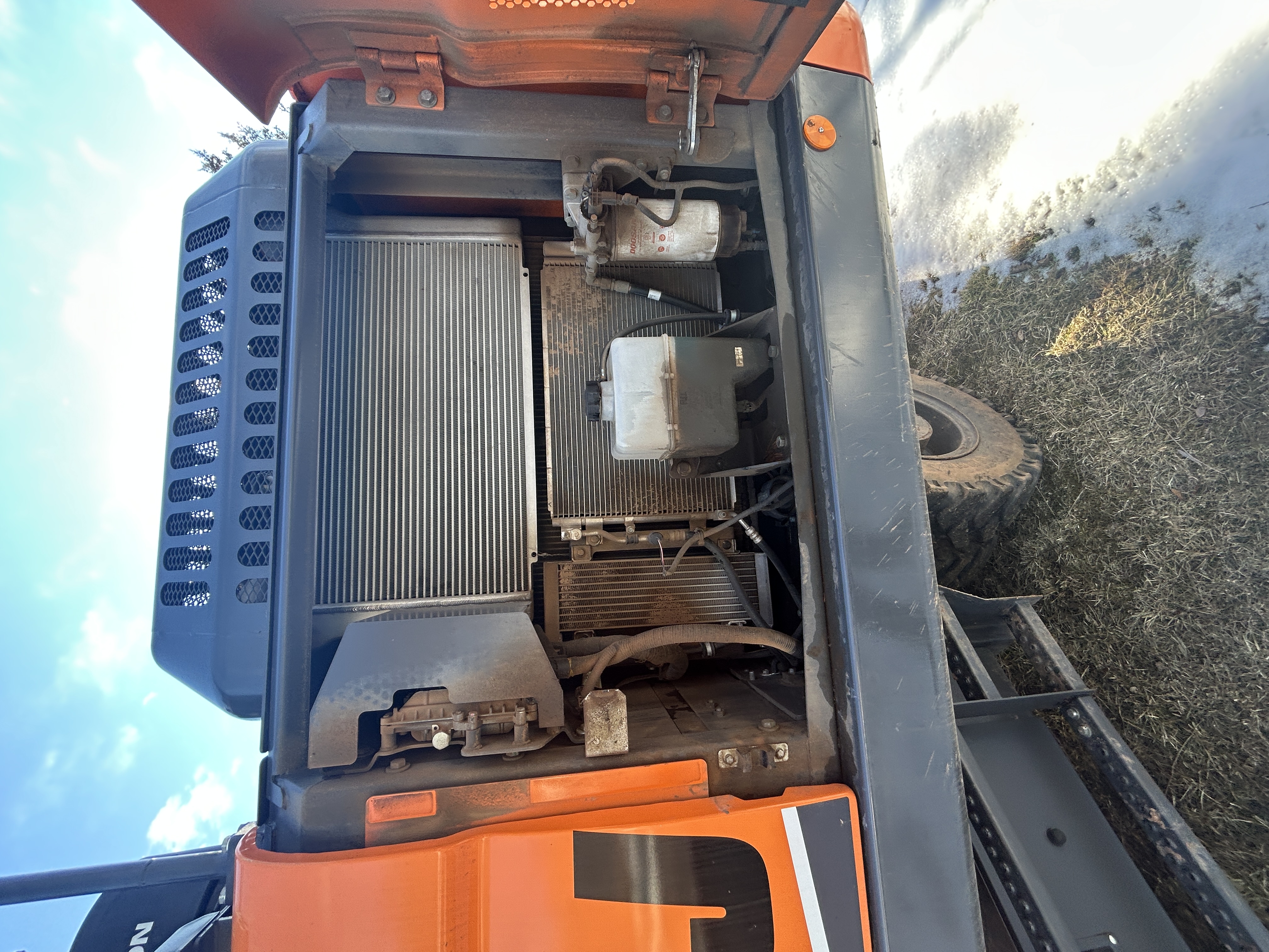 Develon DX210W — $159,000 — photo 9